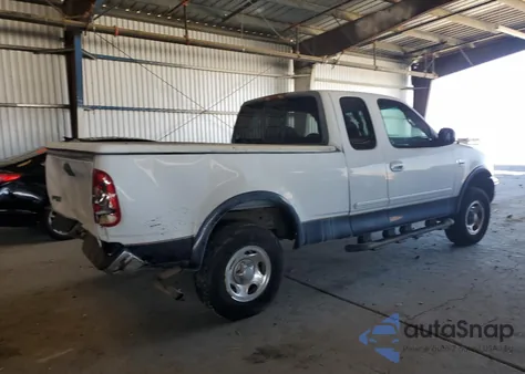 1999 Ford F150 z USA, uszkodzony, nr VIN 1FTRX18W9XKA31862